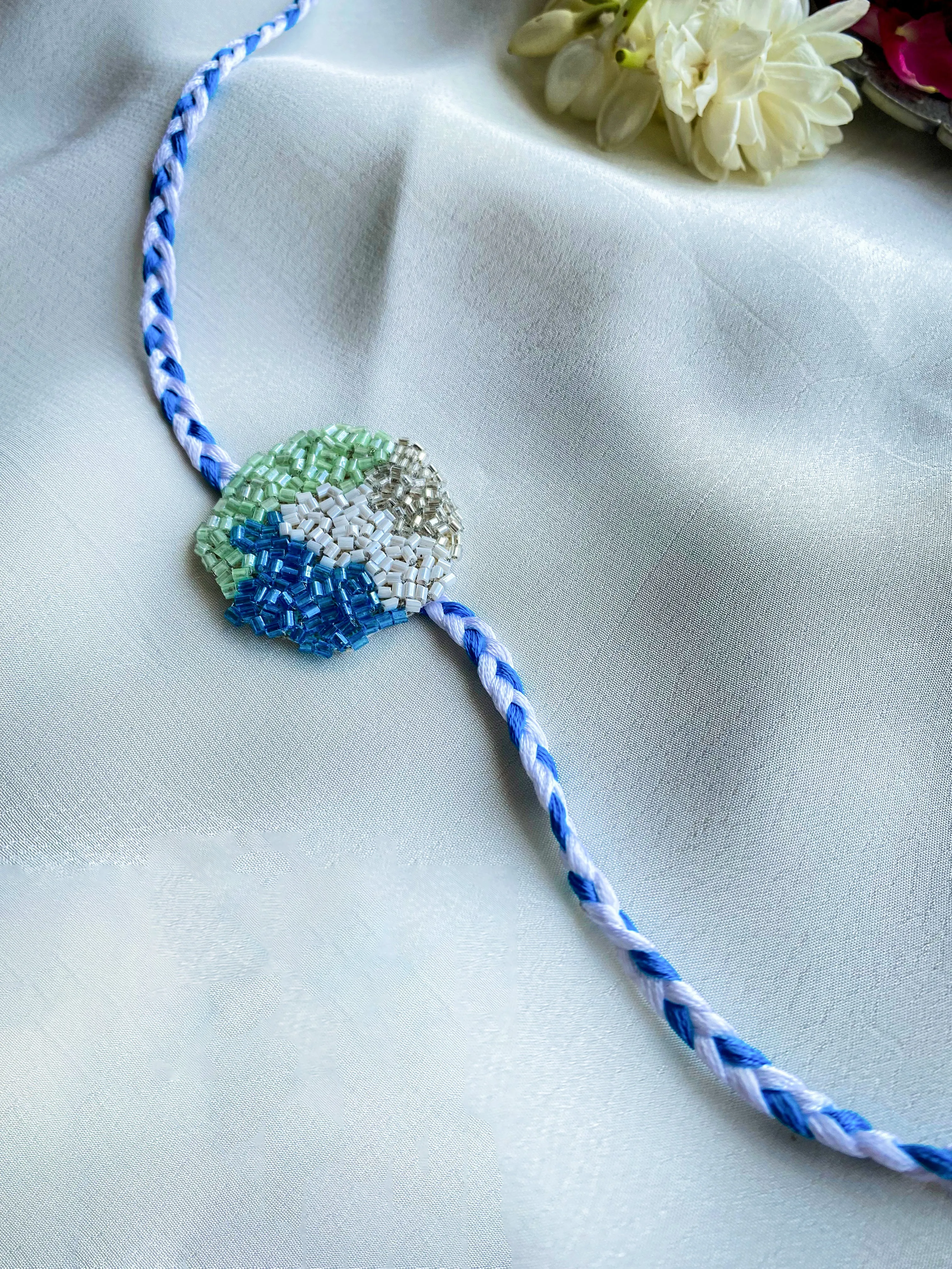 Blue Orchid Embroidered Rakhi